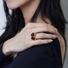 Step into bold elegance with TABAYER's Oera Statement Ring, crafted from Fairmined 18K yellow gold. This striking piece boasts a sleek, contemporary design, perfect for making a sophisticated statement. • Fairmined 18k yellow gold • In stock in size 5.5. Additional sizes are made to order, please allow 2-4 weeks for delivery. Every TABAYER piece is handcrafted in Italy with meticulous care using 100% artisanal Fairmined gold, ensuring the smallest ecological footprint possible. Modern Open Signet Ring For Wedding, Modern Oval Rose Gold Rings, Modern Rose Gold Oval Rings, Modern Gold Signet Ring For Wedding, Modern Gold Wedding Signet Ring, Luxury Open Ring For Formal Occasions, Elegant Rose Gold Open Signet Ring, Modern Hallmarked Open Ring Jewelry, Modern 14k Gold Rings For Everyday Luxury