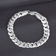 925 Silver Bracelet. Wt 50 Gms Classic Silver Cuban Link Bracelet, Classic Silver Chain Bracelet For Everyday, Classic Silver Charm Bracelet For Everyday, Modern Silver Bangle Charm Bracelet, Silver Cuban Link Jubilee Bracelet For Everyday, Classic Sterling Silver Cuban Link Bracelet With Silver Chain, Classic Silver Cuban Link Bracelet For Everyday, Classic Silver Chain Charm Bracelet, Classic White Gold Charm Bracelet With Silver Chain