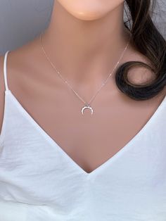 Crescent Moon Necklace in sterling silver. It makes with .. -Sterling Silver Hammered Crescent Moon Pendant 16x16mm, -Sterling silver cable chain wt spring clasp, -Come up with beautiful ribbon gift box and -One set of Care instruction package. Personalized Gifts https://www.etsy.com/shop/rainbowearring?ref=listing-shop2-all-items-count§ion_id=11442300 IF you are not sure about chain length or would like to adjust the length of the necklace, please Add Adjustable chain extender https://www.etsy. Minimalist White Crescent Necklace, Silver Crescent Minimalist Necklace, Silver Crescent Charm Necklace, Sterling Silver Moon Phase Charm Necklaces, Sterling Silver Moon Phase Necklace, Crescent Moon Charm Necklace In Stainless Steel, Silver Crescent Brass Necklace, Dainty Moon Necklace, Tusk Necklace