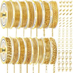 gold bracelets and rings hanging from chains on a white background with clippings