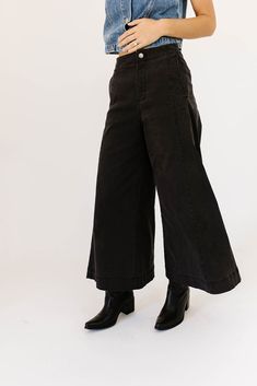 a pair of black wide-leg pants that are sooo good, you’ll never want to take them off. the high-rise + fitted waistline gives it “business casual” charisma, while the flowy loose legs keep things real + relaxed. full of versatility, you can dress them up or down for any occasion. black // wide leg, high waisted, one button zip fly, belt loops, pockets paired with our matilda mesh top + lover denim vest model is 5'8" + wearing a small measurements are approximate + taken while laying flat small : Chic Wide Leg Washed Black Flare Jeans, Chic Wide Leg Flare Jeans In Washed Black, Fall High-waisted Wide Leg Pants For Elevated Casual, High Waist Wide Leg Pants For Fall, High Waist Wide Leg Pants For Elevated Casual Fall, High Rise Wide Leg Pants For Fall Workwear, Chic High Rise Wide Leg Pants For Fall, Mid-rise Flare Jeans In Washed Black For Work, High Rise Wide Leg Pants For Elevated Casual Fall