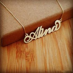 🌹🌹🌹 What a wonderful Gift for your that special person in your life. She will cherish her Solid 14k yellow gold personalized necklace forever and ever....Order any name and your chain length. A very special gift custom made Personalized Jewelry gift indeed...🌹🌹🌹 ------------Necklace Details--------------🌹 All Solid 14k Yellow Gold nameplate and chain.🌹 Order any name with one capital letter, MAXIMUM  6 letters. (write to me about special order names)🌹 .4 mm nameplate thickness. Maximum Customized Gold Pendant Necklace, Custom Gold Pendant Necklace, Pendant Name Necklace For Anniversary Gift, Gold Pendant Name Necklace For Anniversary, Yellow Gold Name Necklace For Anniversary, Custom Gold Plated Nameplate Necklace, Custom Name Yellow Gold Jewelry For Anniversary, Customized Gold Necklace For Anniversary, Classic Gold Name Necklace For Personalized Gift