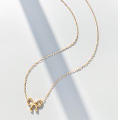 ITEM: Bow Pendant Necklace 18K Gold Plated, Simple Style, Cute Necklace, Gold / Silver Chain Length: 16" (40cm)+ 2" (5cm adjustable) Chain Width: 0.15 Pendant: 1.5x1.3cm Weight: 3g MATERIALS - Titanium steel with 18K gold plated, more durable and comfortable. It still shines like new after long time use. PACKAGE - The Perfect Gift ❤ Each order would be individually gift-wrapped. See picture about that a pink jewelry pouch with flap  (8x8cm). SHIPPING - ✦ I offer FREE shipping within Canada but p Gold Plated Chain Necklace Gift, Gold-tone Clavicle Chain Necklace For Gift, Gold Clavicle Chain Jewelry As A Gift, Yellow Gold Plated Chain Necklace Gift, Yellow Gold Plated Chain Necklace As Gift, Gold Charm Necklace With Clavicle Chain For Formal Occasions, Minimalist Plated Chain Necklace As Gift, Gold-tone Necklace With Adjustable Chain As Gift, Plated Chain Necklace Gift