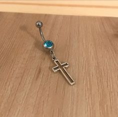 Simple, but cute! Cross charm hangs on your choice of gem color. Material: Surgical stainless steel Cactus Jewelry, Indian Arts And Crafts, Star Cross, Gold Sun, Lavender Color, Cross Charms, Belly Rings, Silver Cross, Earrings Photo