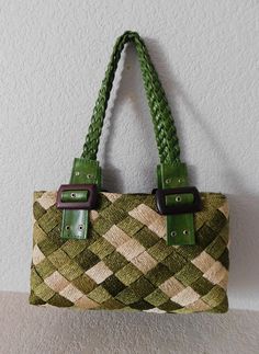 Natural fiber woven shoulder bag Green and parchment beige  Woven handle 1 interior pocket Zipper closure Condition is grest Measurement - length 12" height 7.5" depth 4" handle drop 10.5" Luxury Handwoven Green Bags, Bag Green, Beautiful Lights, Measurement Length, Green Bag, Natural Fibers, Elk, Purses And Handbags, Hand Woven