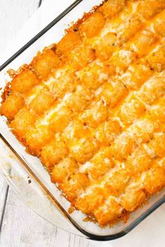 a casserole dish with cheese and bread on the top is ready to be eaten