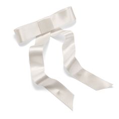 This delicate silk bow was crafted exclusively for Priyanka Chopra to wear to the MET Gala 2023 - Karl Lagerfeld: A Line of Beauty. With its exquisite petite design, this bow will add an air of sophistication to any ensemble. Available in ivory and black, the Priyanka Bow is sure to be admired.