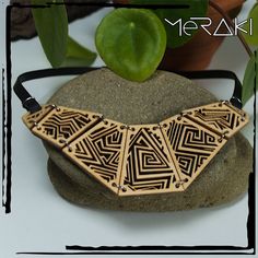 Laser cut wood and steel geometric necklace. Light, elegant and comfortable to wear all day. Cut on 6mm thick poplar wood glued on a black inner tube and mounted with a stainless steel magnetic clasp that does not rust or darken over time, the cord is made of solid black rubber. The pendant measures 14 x 6 cm. The colour may be slightly different from the item shown in the pictures, the tone and grain of the wood may vary due to materials used and different screen settings. All the pieces are as Wood Laser Engraving Machine, Laser Cut Necklace, Laser Cut Wood Crafts, Wood And Steel, Laser Cut Jewelry, Laser Cut Earrings, Engraved Pendant, Laser Engraving Machine, Inner Tube