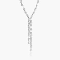 14K White Gold Cascading Lab-Created Diamond Lariat Necklace. Not for the faint of the heart This glorious lab-created diamond lariat necklace is a head-turner! A modern, asymmetrical necklace that features one side of emerald cut diamonds, while the other side has oval cut diamonds. Diamond Solitaire Necklace Long, Luxury Lariat Diamond Necklace For Formal Occasions, Diamond Lariat Necklace For Wedding, Diamond Lariat Necklace With Long Drop For Wedding, Diamond Lariat Necklace For Wedding With Long Drop, Diamond Long Drop Lariat Necklace For Wedding, Diamond Lariat Backdrop Necklace For Wedding, Diamond Lariat Drop Necklace For Wedding, White Gold Lariat Necklace For Wedding