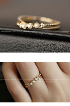 Beautiful 18k solid gold ring made with three mini freshwater pearls. Criss cross ring with high quality 5A cubic zirconia diamonds. #pearlring #goldring #18carat | June Birthstone Ring | zirconia diamonds | beautiful jewelry | Elegant Stackable Ring Jewelry, Elegant Stackable Cubic Zirconia Rings, Delicate Diamond Accented Ring Jewelry, Delicate Diamond Accented Ring, Gold Gemstone Stackable Rings For Promise, Gold Stackable Promise Rings With Gemstones, Elegant Diamond White Stackable Crystal Ring, Delicate Gold Stackable Rings With Diamond Accents, Elegant Stackable Crystal Diamond Ring