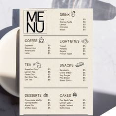 the menu for meu is displayed on a table