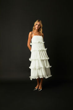 This Pleated Tiered Long Dress is a must-have for your wardrobe! Crafted from lightweight and breezy pleated fabric this dress features adjustable spaghetti straps for the perfect fit and delightful lettuce hems that really make this piece stand out. The tiers create an elegant silhouette and the design pairs perfectly with sandals for a timeless look. Spring Elegant Tiered Dress With Spaghetti Straps, Elegant Spring Tiered Dress With Spaghetti Straps, Elegant Tiered Spaghetti Strap Dress For Spring, Elegant Tiered Dress With Spaghetti Straps And Ruffle Hem, Spring Layered Dress With Spaghetti Straps, Spring Tiered Dress With Layered Ruffles And Straps, Summer Pleated Tiered Dress, Spring Tiered Dress With Spaghetti Straps And Ruffle Hem, Spring Tiered Dress With Adjustable Straps