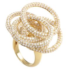 A whirlwind of diamonds take center stage in the design of this lavish cocktail ring. The ring is made of 18K yellow gold and features overlapping circle motifs set with diamonds. Circle Diamond, Circle Ring, The Ring, Center Stage, Diamond Cluster, Cocktail Ring, Cocktail Rings, Rose Gold Ring, Pretty Things