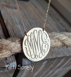 "Monogram initials disc necklace from solid gold. Order your initials and it will be hand engraved in beautiful script font. Amazing personalized gift for any occasion: wedding, birthday, graduation, Christmas.  Designs by Keti Sorely Made in USA.   Metal options: * 10K (Yellow, Rose or White) * 14K (Yellow, Rose or White) * 18K (Yellow, Rose or White) Choose disc size between 1/2\" to 1.5\" Comes on 18\" chain (please email us if you would like a shorter chain). Model is wearing a 3/4\" monogra Initial Disc Necklace, Beautiful Script Fonts, Engraved Initials, Gold Monogram, Disc Necklace, Christmas Designs, Script Font, Monogram Initials, Hand Engraving