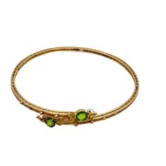 Antique 10kt Gold Filigree Etruscan Bangle Bracelet (A698) Size: Inner circumference slightly under 2.5, 5.66 gms Color: Gold, green Condition: Very good vintage Details: marked and tested. Stones look like peridot but come up as glass when tested. Hand-done, beautifully designed. No clasp! Please look at all the photos, as they are part of the description. I try my best to point out any flaws. Also please remember this is a preloved piece and may show signs of light wear, marks, scratches, etc. I will be posting a lot more jewelry, Keep checking back. Vintage Details, Vintage Vanity, Gold Filigree, Vintage Rhinestone, Vintage Costume Jewelry, Remember This, Classic Vintage, Women Accessories Jewelry, Bangle Bracelet