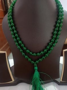 108 Beads Natural green onyx Japa Mala Prayer Beads semi-precious Gemstone Round Beads // Long Tassel Necklace// Meditation japa mala // Guru bead// Necklace Yoga Beads green Color // 8 mm Bids size - 8mm approx Z Green Necklace color - green It is known as the 'love stone' as the message it emits is the strong vibration of unconditional love, joy, warmth and healing. As quartz crystals are profound amplifiers of energy, it may help to kindle happiness, love, romantic feelings and sensuality. It Traditional Hand-strung Jade Beaded Necklace, Traditional Jade Beaded Necklaces With Gemstone Beads, Spiritual Jade Beads For Meditation, Green Spiritual Beads For Healing, Traditional Green Necklace For Meditation, Traditional Green Agate Necklace, Green Spiritual Beads, 108 Count, Green Hand-strung Spiritual Mala, Traditional Green Jade Beaded Necklaces