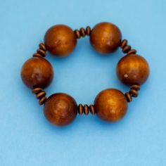 7 inch, Vintage Wooden Ball Beads Bohemian Beaded Bracelet  GENERAL DESCRIPTION Color: Silver Tone Size: 7 inch Material: Wood Last photo includes measurements  If you have any questions please feel free to message me! Cheap Wooden Beads Round Bracelet, Bohemian Rosary Bracelet With Spacer Beads, Bohemian Brown Stretch Bracelet With Spacer Beads, Bohemian Beaded Bracelets With 8mm Beads, Brown Beaded Stretch Bracelet With Round Beads, Spiritual Polished Beads Bracelets, Festival Wooden Beads Stretch Bracelet, Bohemian Stretch Bracelet With Large Beads, Bohemian Brown Stretch Bracelet With Large Beads