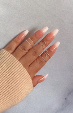 ☾This set includes 3 single band rings, 1 Swirl ring, 2 chevron rings. ☾Stack and switch however you like. Stack them all on one hand or divide them up and wear them on both! So cute, dainty and simple. Wear this stack every day! ☾Made with gold or silver tarnish-resistant plated wire ☾All midi/knuckle rings come in US size 3/4 (15mm diameter) which fits most above the middle of the finger ☾Adjustable and comfortable. The back is open, allowing for some adjusting of size by you ☾Each ring is handcrafted in a heavy 18 gauge wire ☾All rings come in a box to protect them during shipment. This will ensure your ring will arrive undamaged and ready to wear Mid Finger Rings, Midi Ring Set, Lip Gloss Colors, Swirl Ring, Chevron Ring, Knuckle Rings, Midi Rings, Lip Tint, Stackable Rings