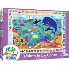 a puzzle box with an image of dolphins and other marine creatures on it, including the words'colors in the ocean '