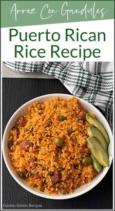 a white bowl filled with rice and vegetables next to an avocado on the side