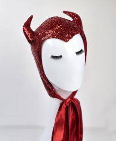 The headpiece features red sequin fabric and playful horns, making it a perfect addition to any costume.  One size fits most, head circumference- 22-23 inches.  Lightweight and comfortable to wear all night long. The bonnet is completely lines and has long ties, which you can tie into a bow, leave hanging like a scarf, or style however you like. Fits a variety of Halloween and Cosplay costumes. Pair it with your evening outfit and turn it into a Halloween or party costume with just one headpiece. This headpiece will add style and shine to your costume, ensuring you're the centre of attention! Welcome custom orders, I love it, please message me. Red Fantasy Headpiece For Costume Party, Fantasy Red Headpiece For Costume Party, Red Fantasy Costume Headpieces, Fantasy Winter Party Costumes, Red Costume For Cosplay Party, Red Winter Party Costume, Red Costume Accessories For Costume Party, Red Fitted Costume Accessories For Themed Events, Fitted Red Costume Accessories For Themed Events