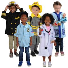 children in fireman's uniforms posing for the camera