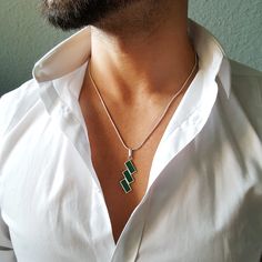 "Mens silver geometrical necklace Malachite gemstone, Handmade Jewelry for men, Chain with pendant, Unique Gifts for men, for him Gnatus geometrically designed Sterling silver pendant with natural Malachite gemstone inlay. This beautiful pendant is worked with the technique of inlay, which means the stone is worked seamlessly into the Sterling silver. The inlay is made from natural Malachite gemstone, which has a rich deep green color. A Sterling silver hoop of 10mm is placed on the upper part o Mens Gemstone Jewelry, Mens Stone Necklace, Mens Stone Pendant, Unique Gold Pendant For Men, Men’s Pendant Necklace, Stone Pendant Design, Gemstone Pendant For Men, Male Necklace Pendants, Men’s Crystal Necklace