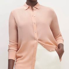 Nwot Everlane Clean Silk Relaxed Shirt In Blush Pink Beautiful Blouse! Brand New Without A Tag 100% Silk A More Relaxed Take On The Classic Button-Downwith A Silky Smooth Feel. Polished And Easy, The Clean Silk Relaxed Shirt Has A Traditional Point Collar And A Round Hem That Looks Just As Good Worn Loose As It Does Tucked In. Plus, It’s Made Of Our Eco-Conscious Clean Silk, For More Beauty And Less Waste. Safer For The Environment: This Product Is Dyed With Bluesign-Approved Dyes, Which Are Safer For Dyehouse Workers And Better For The Environment. Elegant Relaxed Fit Pink Top, Pink Relaxed Fit Elegant Top, Classic Pink Tops For Summer, Pink Relaxed Fit Elegant Blouse, Classic Pink Summer Top, Classic Pink Summer Tops, Classic Pink Blouse With Relaxed Fit, Elegant Pink Relaxed Fit Top, Classic Pink Long Sleeve Tops