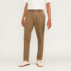 Pleated and put together. Our top-performing chinos are now available in a new, lightweight organic cotton that’s perfect for warm weather. We added single front pleats to the tapered legs for a more elevated look. The Organic Cotton Pleated Chino features two front-slant pockets and back welt pockets with a button closure, and a zipper front and button closure. Organic cotton uses crop rotation, cover crops, and organic fertilizers instead of toxic chemical fertilizers or pesticides—which m Tapered Leg Chino Cotton Twill Chinos For Streetwear, Everyday Ankle-length Chinos With Welt Pockets, Casual Non-stretch Cotton Chinos, Cotton Chinos With 4-way Stretch And Tapered Leg, Organic Fertilizers, Non-stretch Cotton Chinos, Cover Crops, Cropped Chinos, Crop Rotation