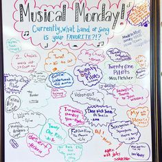 a white board with writing on it that says musical monday currently what band or song is your favorite?