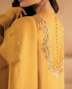 Classy Embroidery Designs, Nidhi Tholia Suits, Zardozi Embroidery Designs Kurti, Elegant Eid Zari Work Embroidered Dress, Elegant Yellow Embroidered Fabric With Zari Work, Transitional Embroidered Dress With Dabka Work, Applic Work Dresses Pakistani, Embroidery Fashion Detail, Latest Dress Design