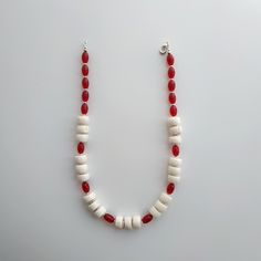 < One strand white coral and glass beaded necklace> The coral is natural, from the bottom of the Pacific Ocean. The clasp is made from metal. > Necklace length - 38 cm (14,9 in) > Necklace weight - 41 grams White Bohemian Necklace With Oval Beads, Bohemian White Necklace With Oval Beads, Bohemian White Necklaces With Oval Beads, Bohemian White Oval Beaded Necklaces, White Shell Necklace With Round Beads For Gift, White Round Beads Shell Necklace Gift, White Round Beads Shell Necklace As Gift, White Jewelry With Oval Wooden Beads, White Wooden Beads Jewelry