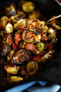 cooked brussel sprouts and bacon in a skillet