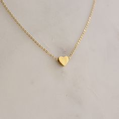 Dainty Heart Pendent Necklace  - This listing is for pair os the Dainty Heart Pendent Necklace. Perfect for everyday and layering - Length: 16" + 2" extender  - Base Material: High Quality Stainless Steel - Finish: 18K Gold - Measurements: Heart - 7mm/7mm  - Nickel Free and Tarnish Free - All our jewelry is packaged in gift ready boxes. If you would like multiple items from your order packaged separately please let us know! © 2024 Generation of Daughters Simple Neck Chain, Pendent Gold, Heart Gold Necklace, Gold Necklace Dainty, Gold Gallery, Heart Pendent, Gold Necklace Indian, Gold Necklace Simple, Gold Necklace Indian Bridal Jewelry