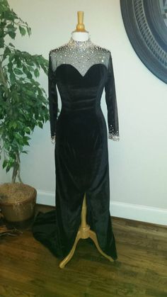 Style #1101 is one of our long sleeve black velvet evening gowns that has been in the collection for a while as it is timeless. Black Velvet Gown, Velvet Evening Gown, Special Occasion Gowns, Custom Gown, Velvet Gown, Long Sleeve Evening Dresses, Pageant Gowns, Black Gown, Pageant Dresses