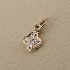 Solid 14k Yellow Gold Charm Pendant Pave Diamond Minimalist Jewelry Gift For Her PEMJ-1819 Gross Wt : 0.49gm 14k Gold Wt : 0.47gm Diamond Wt : 0.1ct Pendant Size : 5 MM You can contact me if you have any query about anything.  Have a FINE ADORNMENT!!  ✦ This is the perfect gift for mom, wife, fiancée, girlfriend, valentine, daughter, family or friend. It is a special gift for mother's day, valentine's day, wedding, anniversary, birthday, Christmas, Easter, New Year's and any holiday. ✦ Custom Orders : Since most products are handmade and made by members of my shop , you can ask us any kind of customization. You can choose from 14k Gold, 925 Silver And Diamond. For most of the items. Gemstone can be changed as per your preferences. ✦Thank You for visiting our shop. ❤ 14k Gold Jewelry With Flower Charm For Anniversary, 14k Rose Gold Jewelry With Flower Charm, 14k Yellow Gold Filled Jewelry With Flower Charm, 14k Yellow Gold Jewelry With Flower Charm, Everyday Yellow Gold Jewelry With Flower Charm, 14k Gold Filled Yellow Gold Flower Pendant Jewelry, 14k Gold-filled Yellow Gold Flower Pendant Jewelry, 14k Gold Flower Pendant Jewelry With Birthstone, Small Gold Diamond Jewelry