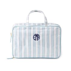 Featuring playful prints inspired by Palm Beach's fun-loving coastal aesthetic, this travel case is a stylish way to keep your beauty essentials organized. With a glossy wipeable coating inside and out and sturdy construction, this toiletry bag stands up to your travel needs. The main compartment has a wide zipper opening perfect for larger bottles and tubes. The secondary fold out compartment is great for flatter items such as compacts. Both sections have zippered pockets for smaller items such Coastal Aesthetic, Mark And Graham, Bag Stand, Ticking Stripe, Accessory Pouch, Monogram Gifts, Toiletry Bags, Gift Finder, Beauty Queens