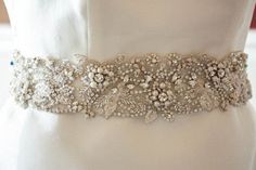 Beaded wedding dress belt Flora 27 to 28 Inches Made to Elegant Silver Embellished Bridal Belt, Elegant Bedazzled Wedding Sash, Elegant Bedazzled Bridal Belt For Wedding, Silver Bedazzled Bridal Belt For Wedding, Silver Embellished Bridal Belt For Wedding, Elegant Bedazzled Silver Bridal Accessories, Elegant Silver Bedazzled Bridal Accessories, Elegant Bridal Accessories With Pearl Embroidery For Ceremony, Bedazzled White Bridal Belt For Wedding