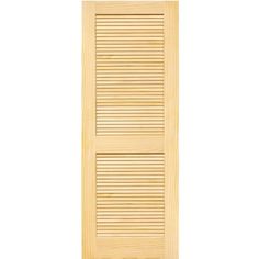 a wooden door with slatted panels on the bottom and bottom panel, in light wood