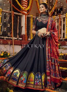 Black Multicoloured Kutchi Embroidered Chaniya Choli is indian traditional wear and excellent pick for this Navratri festival. This elegant set has a very pretty kutchi embroidery enhanced with digital prints, multicolored dori and mirror work detail on flared muslin cotton silk chaniya/lehenga paired with equally embellished muslin cotton choli and fascinating multi embroidered and tasseled cotton dupatta. Team this beautiful attire with classic pair of heels and matching jewellery to look like Navaratri Chaniya Choli, Garba Outfit, Chaniya Choli Designs, Navratri Dress, Black Lehenga, Navratri Chaniya Choli, Gaun Fashion, Choli Designs, Indian Dresses Traditional