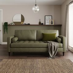 a living room filled with furniture and a rug