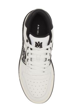 AMIRI adds a new sneaker to their lineup with this low-top style that features a rubberized logo detailing the mesh side wall and tiny star-shaped perforations. Lace-up style Removable insole Leather and synthetic upper/textile and leather lining/synthetic sole Imported Designer Shoes Tiny Star, Side Wall, New Sneakers, Classic Logo, Star Shape, Up Styles, Sneakers White, Low Top, Designer Shoes