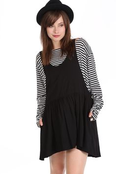 "WhatWouldSusieWear's Black Cut out sides Slouchy Suspender Style Riley Dress. Wear alone, with one of our Frenchie Tops, a bandeau top or cap sleeve T-shirt, over a pair of shorts or our PantalOOnies. The possibilities are endless. Comfy Rayon Challis material is light and flowy. An easy breezy item that is perfect for just about any occasion! Item Details: Measured Flat Please check measurements to chose the size that is best for you! All Items measured flatDOUBLE WAIST MEASUREMENTS> ELASTI