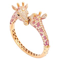 Bracelet giraffe red gold 555 diamonds 16.80 carats 217 pink sapphires 8.20 carats 2 black diamonds 0.49 carats 4 onyx 0.43 carat. Luxury Pink Jewelry With Natural Stones, Luxury Pink Gold Bracelets As A Gift, Luxury Pink Gemstone Jewelry, Luxury Pink Sapphire Fine Jewelry Bracelet, Luxury Pink Sapphire Bracelets, Luxury Pink Diamond Bracelet As Gift, Luxury Pink Diamond Bracelet With Accents, Luxury Pink Diamond Bracelet, Giraffe Ring