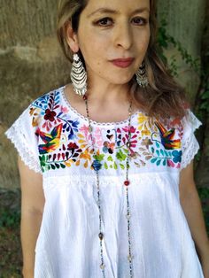 This bohemian sleeveless summer day dress is one of my favorite designs, casual and perfect for any occasion. I personally love to use it when I invite my family and friends to dinner at my place. Trust me, you will receive many compliments when you put it on ;) Mexican blouse. ✔ HIGH QUALITY - This beautiful white blouse with DOVES embroidered is made of fresh and comfortable white manta. Cotton and fresh fabric ✔ UNIQUE - You are one in a million and so is this adorable tunic! This cute and tr Embroidered Boho Dress, White Mexican, White Tunic Dress, Trendy Tunic, Bohemian Blouse, Summer Day Dresses, Mexican Blouse, Peasant Shirt, Hippie Dress