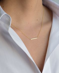 "14K solid gold Bar necklace with a tiny diamond , comes in the gold color of your choice, and length of your choice, dainty and absolutely amazing! The perfect everyday necklace, by itself or layered. made in L.A. Size: Approx. 1\" Diamond: 0.01 ct wt Ships in 5 to 7 business days Comes gift ready in our beautiful branded jewelry box." Minimalist Gold Name Necklace, 14k Gold Rectangular Pendant Bar Necklace, Minimalist 14k Gold Bar Necklace With Rectangular Pendant, Minimalist Yellow Gold Bar Necklace With Rectangular Pendant, Minimalist 14k Gold Name Necklace For Anniversary, Simple Name Necklace With Delicate Chain, Minimalist Gold Nameplate Bar Necklace, Classic Everyday 14k Gold Bar Necklace, Minimalist Nameplate Necklace