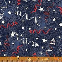 an image of fireworks and stars on blue fabric