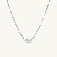 td {border: 1px solid #ccc;}br {mso-data-placement:same-cell;} Details This solid 14K gold necklace has a center prong set marquise diamond. 18" with a loop to be worn at 16". Measurements Carat Weight: 0.17 Chain Length: 16" - 18" Shipping Each piece of jewelry is carefully hand fabricated in our NYC studio so please allow 2-3 weeks for delivery. If you would like to request a rush order please contact the studio at sophie@sophieratner.com. Selecting faster shipping options will not speed up th Marquise Necklace, Nyc Studio, 14k Gold Necklace, Marquise Diamond, Speed Up, The Studio, Chain Length, 3 Weeks, Prong Setting