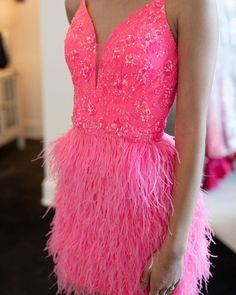 V-Neck Hot Pink Feathers Short Homecoming Dress Glamorous Feathered Mini Dress For Homecoming, Glamorous Homecoming Mini Dress With Feather Trim, Glamorous Feather Trim Mini Dress For Homecoming, Sleeveless Feather Trim Dress For Homecoming, Fitted Feather Dresses For Homecoming, Feather Trim Dresses For Homecoming And Prom Season, Feather Trim Dress For Homecoming And Prom, Feather Trim Dress For Homecoming And Prom Season, Fitted Feather Mini Dress For Prom