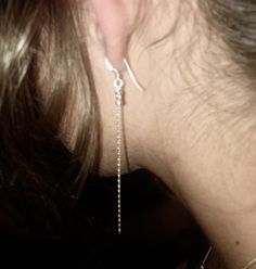 These minimalist  earrings are  so feminine . You will like the fluidity of the chain without the wiggling.   Very light. Dainty  or bohemian chic look. They follow naturally your neckline.  So discreet and at the same time a real statement once noticed. The ear wire is flattened and measures 1/2 inch.  The drop measures 3 1/2 inches for a pendant length of 4". Comes with clear earring backs. Feel free to message me if you have any questions. Thank you for your support <3 Delicate Threader Earrings With Adjustable Chain, Dainty Threader Earrings With Adjustable Chain, Dainty Sterling Silver Linear Earrings With Adjustable Chain, Handmade Elegant Dangle Threader Earrings, Sterling Silver Chain Earrings For Party, Elegant Handmade Long Drop Threader Earrings, Sterling Silver Earrings With Silver Chain For Party, Sterling Silver Dangle Threader Earrings For Jewelry Making, Sterling Silver Dangle Threader Earrings